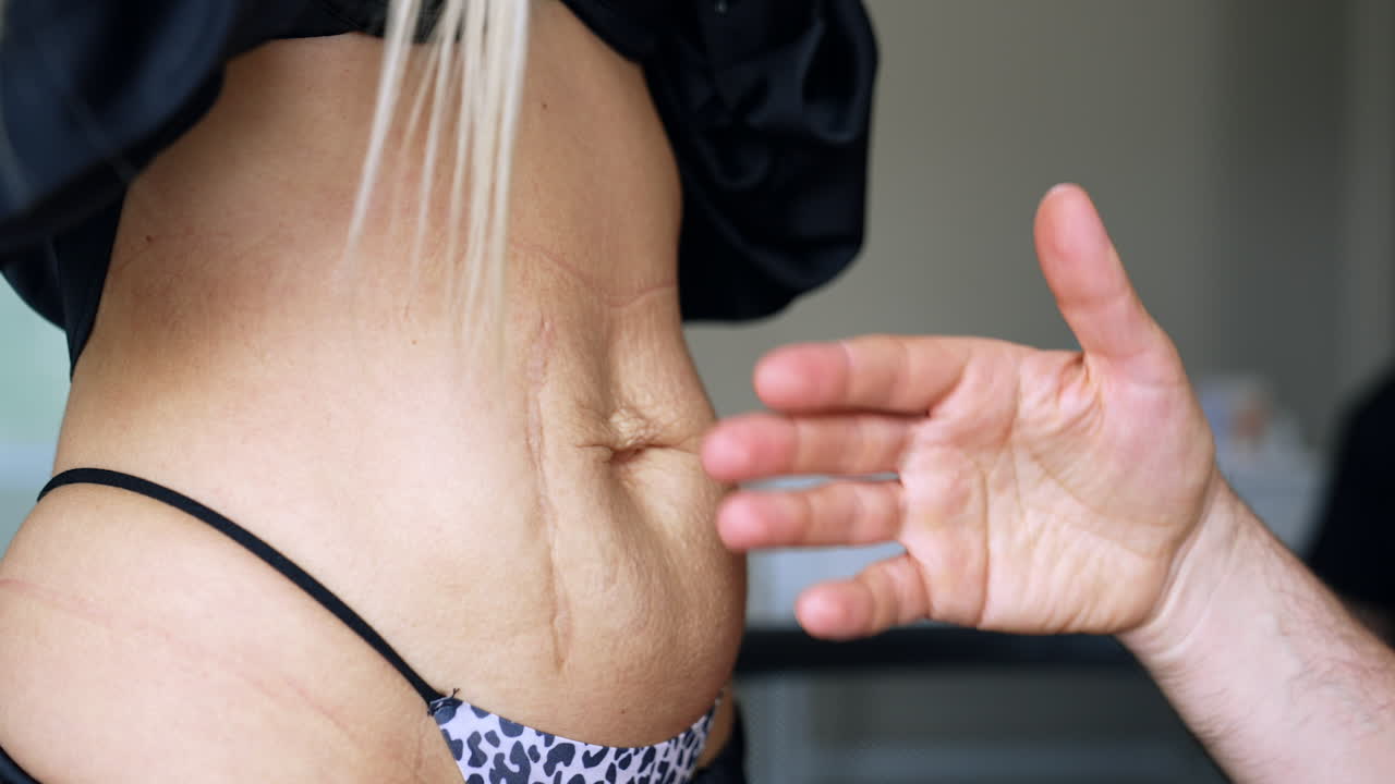 Unrecognized female patient at the doctor's checkup. Preparation and consultation before plastic surgery. Close up.