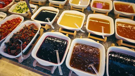 breakfast food on display at the hotel buffet