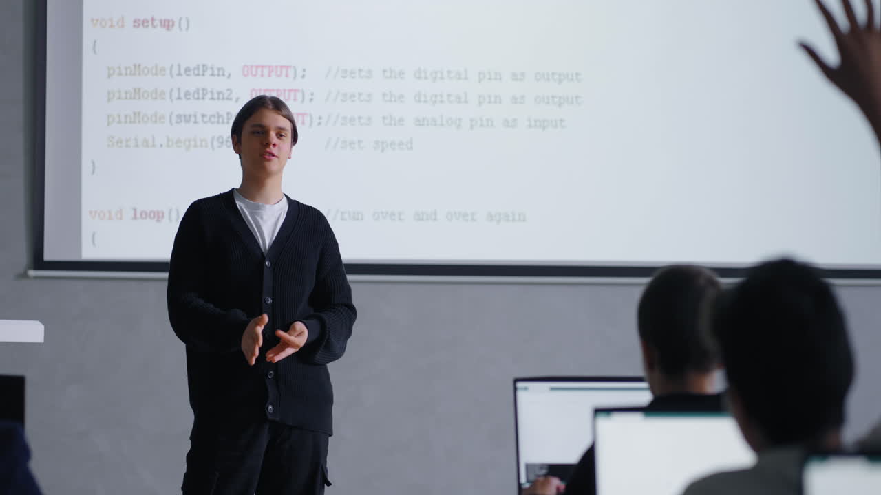 Teenager Presenting Coding Project in Class