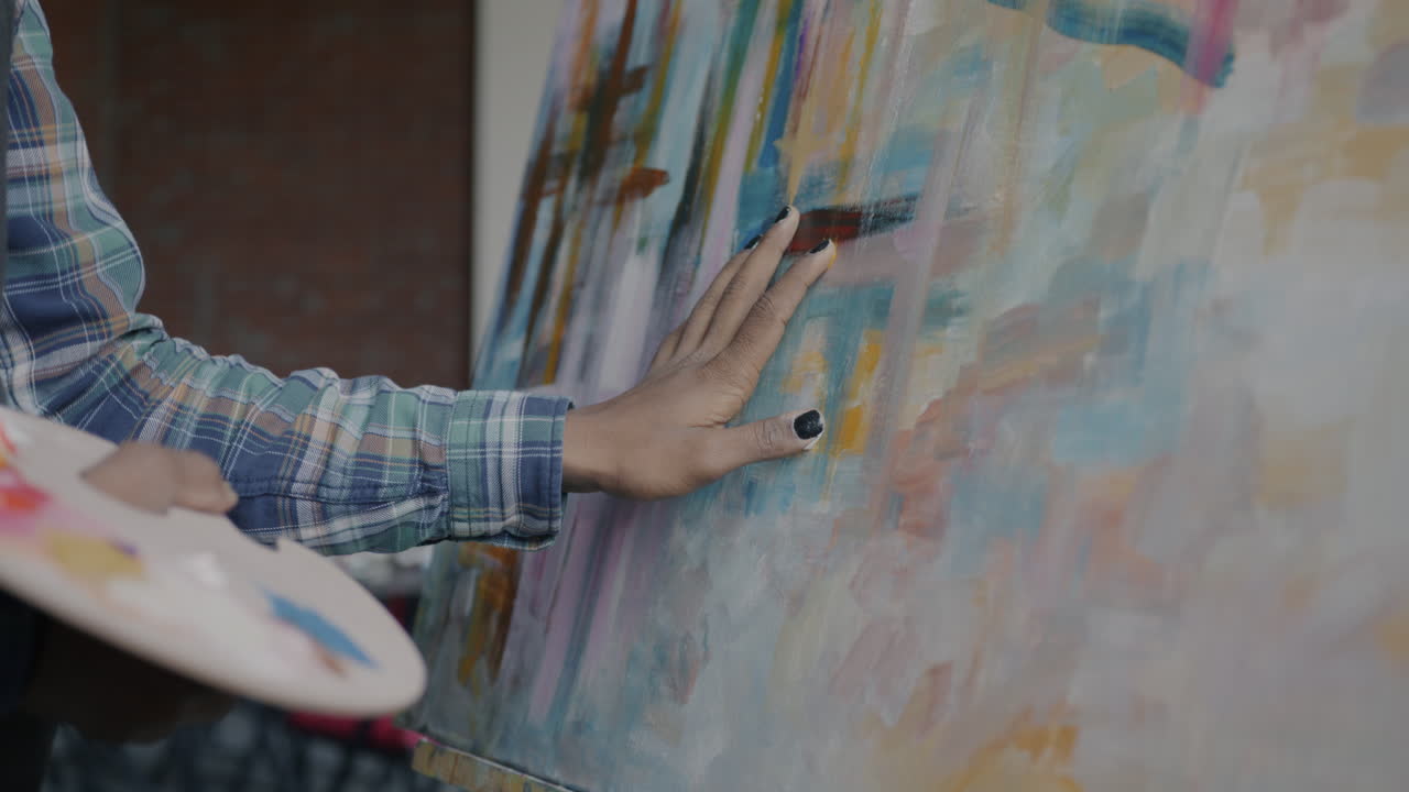 Artist Working on Abstract Painting