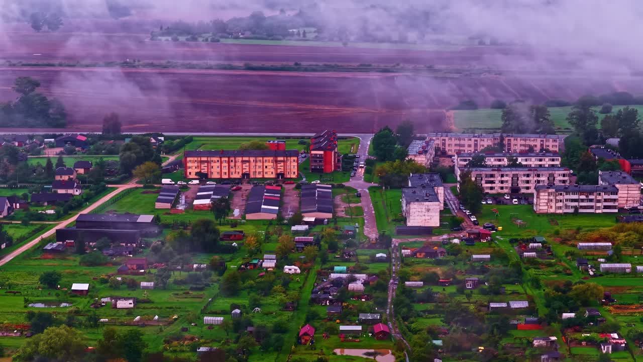 Aerial view of a town on the edge of an agricultural landscape