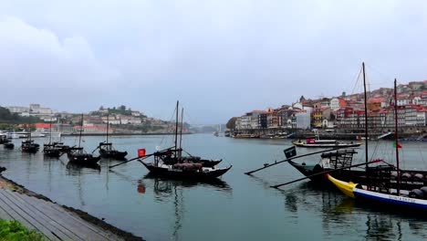 traditional rabelo boats on douro river. porto, portugal