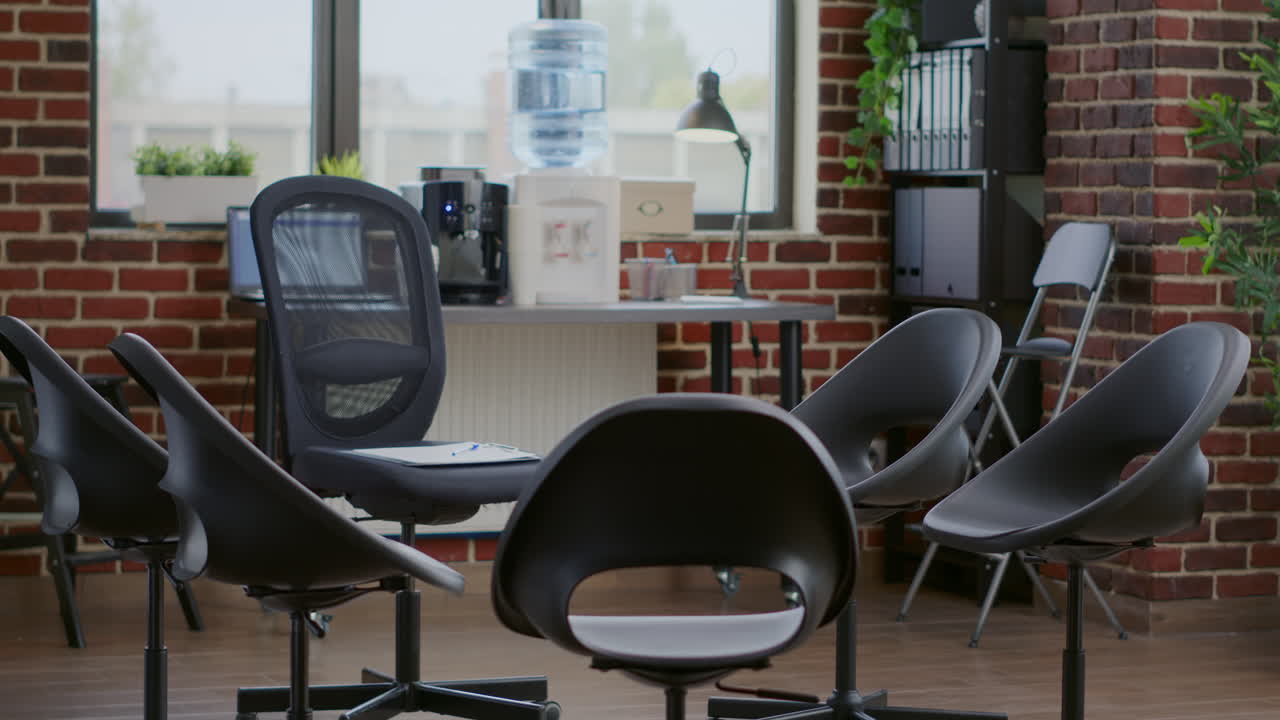 Empty room designed with chairs in circle for aa group therapy session with people