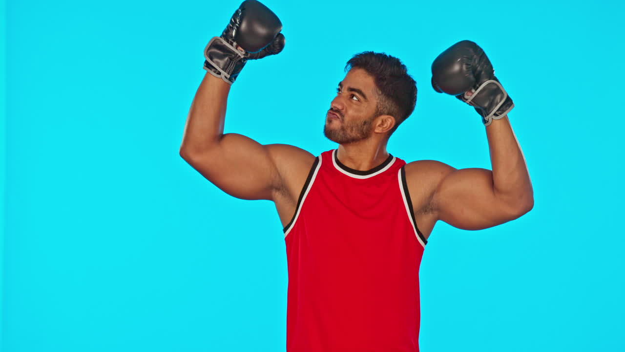 Boxer, man and winner in sports studio isolated