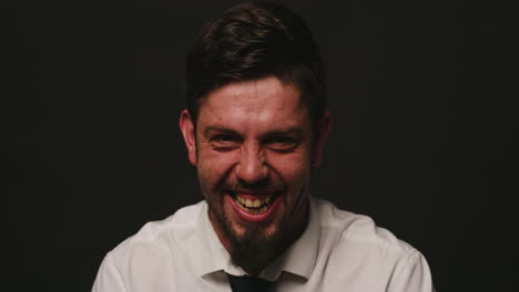 Portrait-of-a-bipolar-patient-against-black-studio