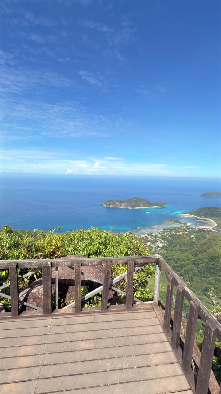 A breathtaking vertical video shot from the wooden viewing platform at the summit of the Morne Blanc Nature Trail in Mahé, Seychelles. vertical video 30fps