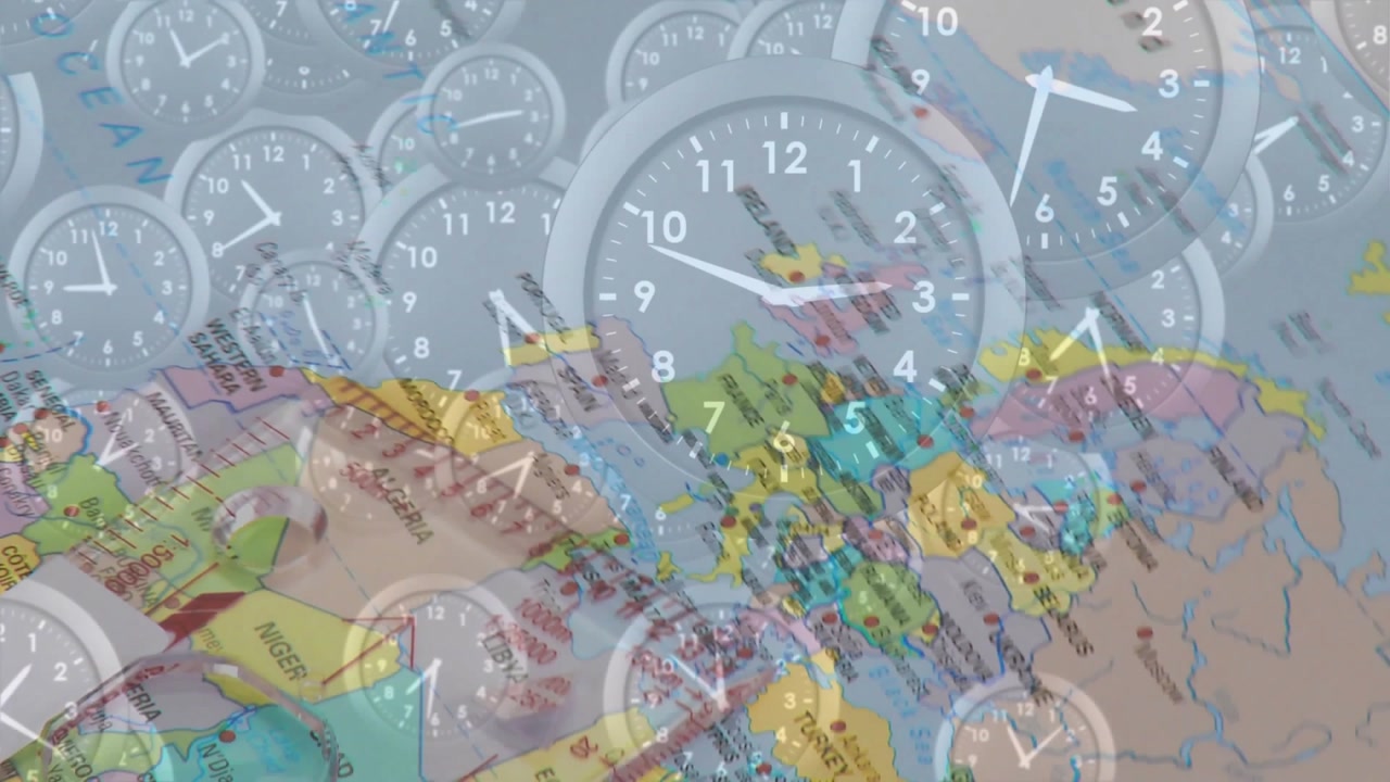 Clock overlay starting map rotating left, tracking time zones on transparent background