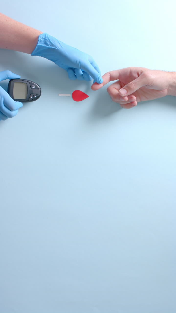 Vertical video of hands of caucasian doctor and patient checking blood sugar level, slow motion