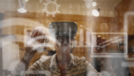 multiple digital icons and binary coding against woman wearing a vr headset at office