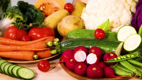 assorted vegetables arranged on a blue background