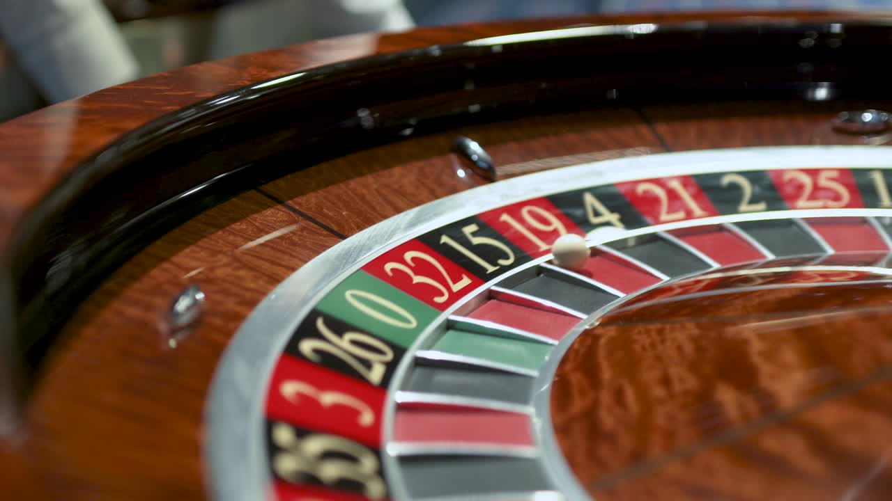 Roulette in the casino spins and white ball