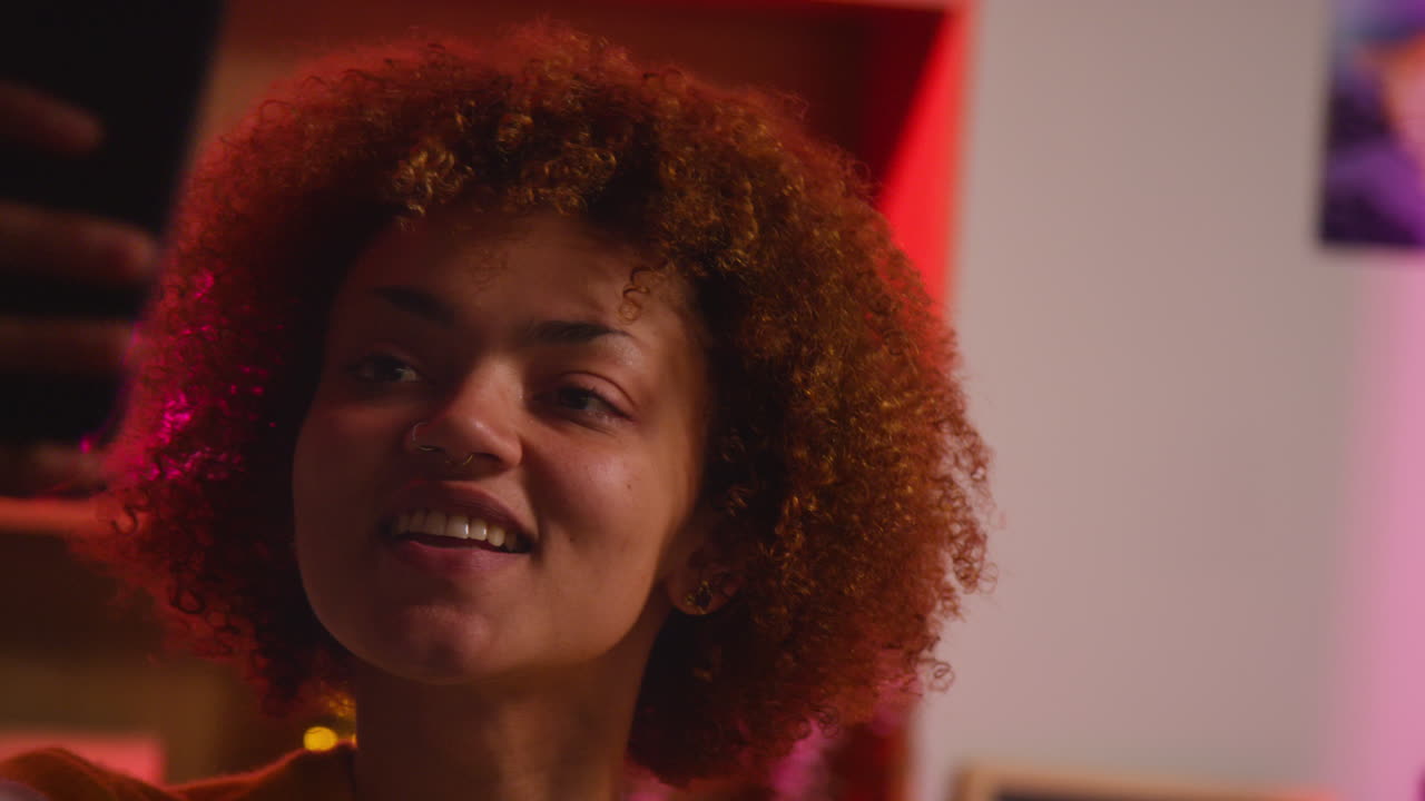 Young Woman Smiling in a Party Room