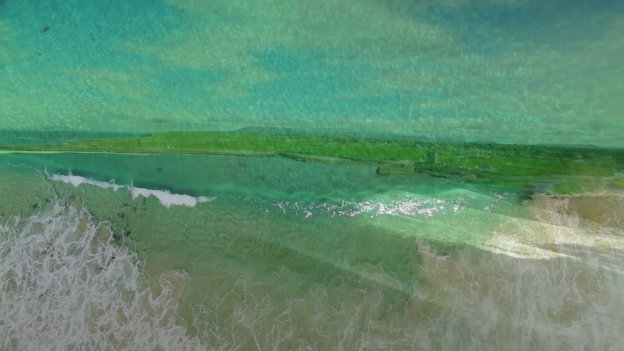 Waves crashing on sandy beach, lush green landscape in background with animation