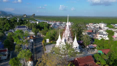 serene traditional thai temple complex, tropical landscape