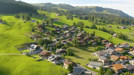 aerial view of mountainside village in european alps