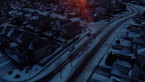 Drone-footage-of-Calgary's-winter-wonderland-during-a-beautiful-sunrise-with-real-estate