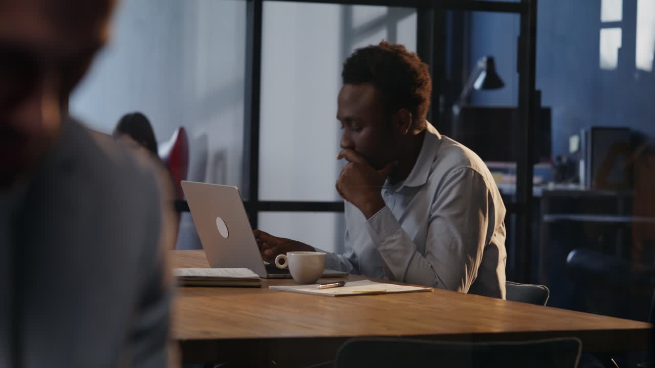 Businessman working on a laptop in an office