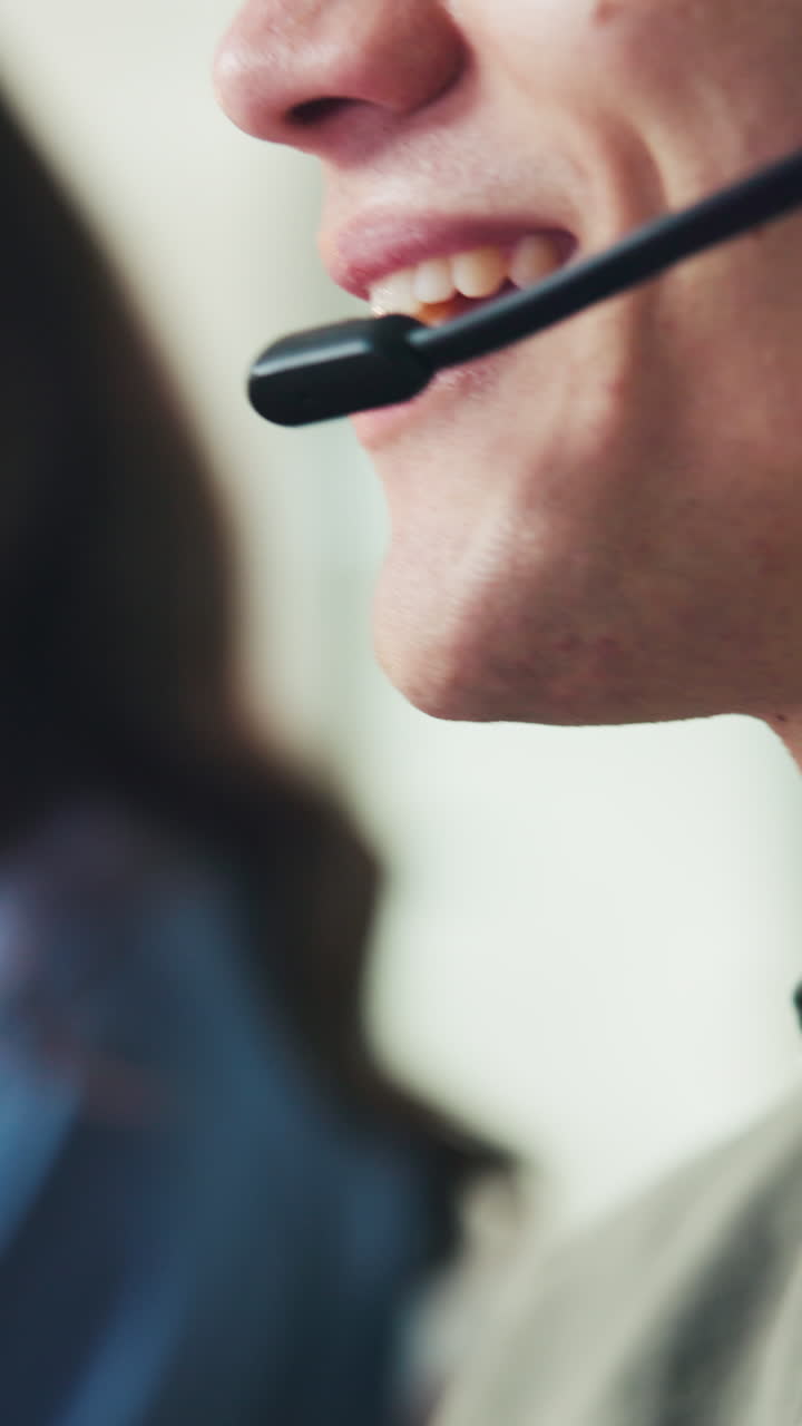 Close-up of Man Speaking with Headset Microphone
