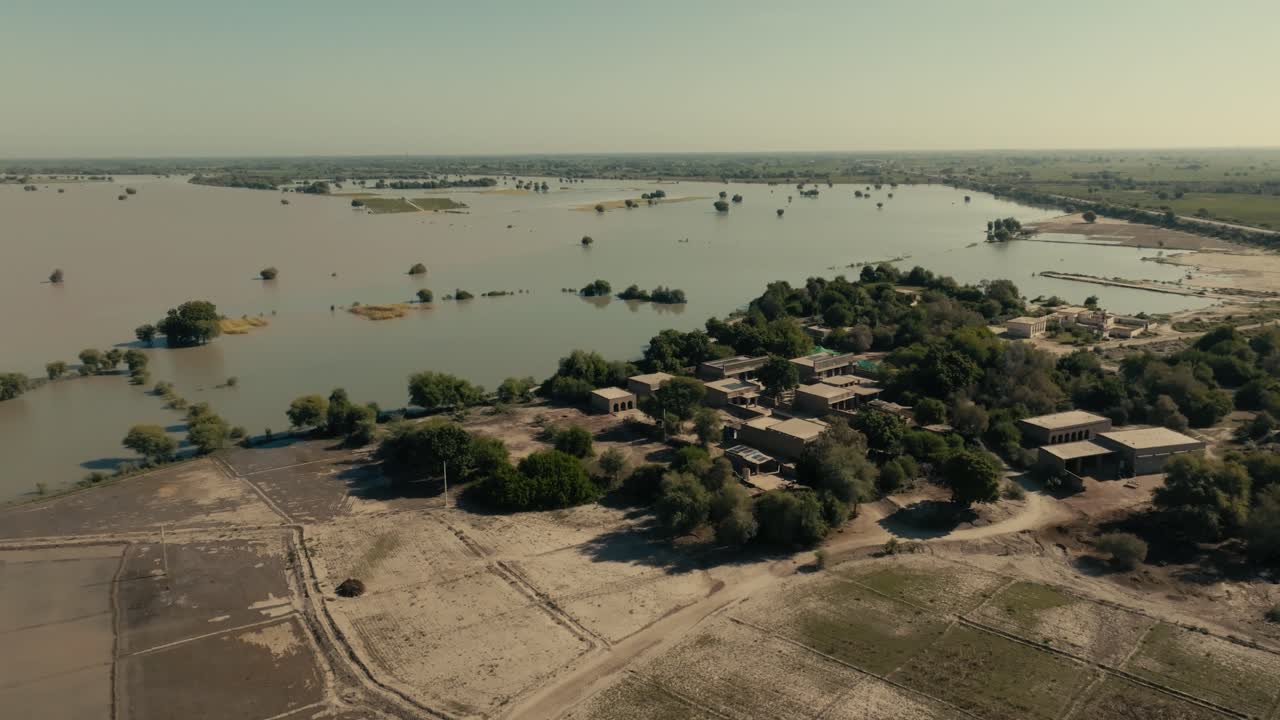 Pan drone view of water logged Punjab city due to flood in Pakistan