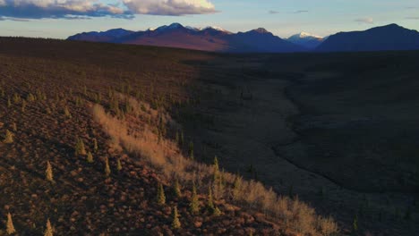 Hyper-lapse-aerial-view-of-Burwash-Uplands,-Amphitheatre-Mountain-Route,-Canada