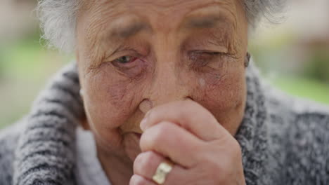 close-up-portrait-of-sad-elderly-woman-crying-looking-lonely-depressed-tired-senior-outdoors