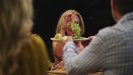 happy family eating dinner together.