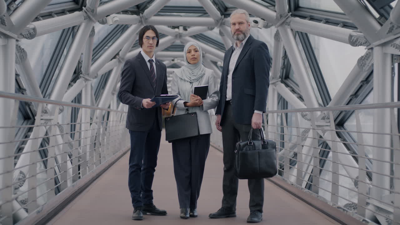 Business Team Meeting on a Modern Bridge