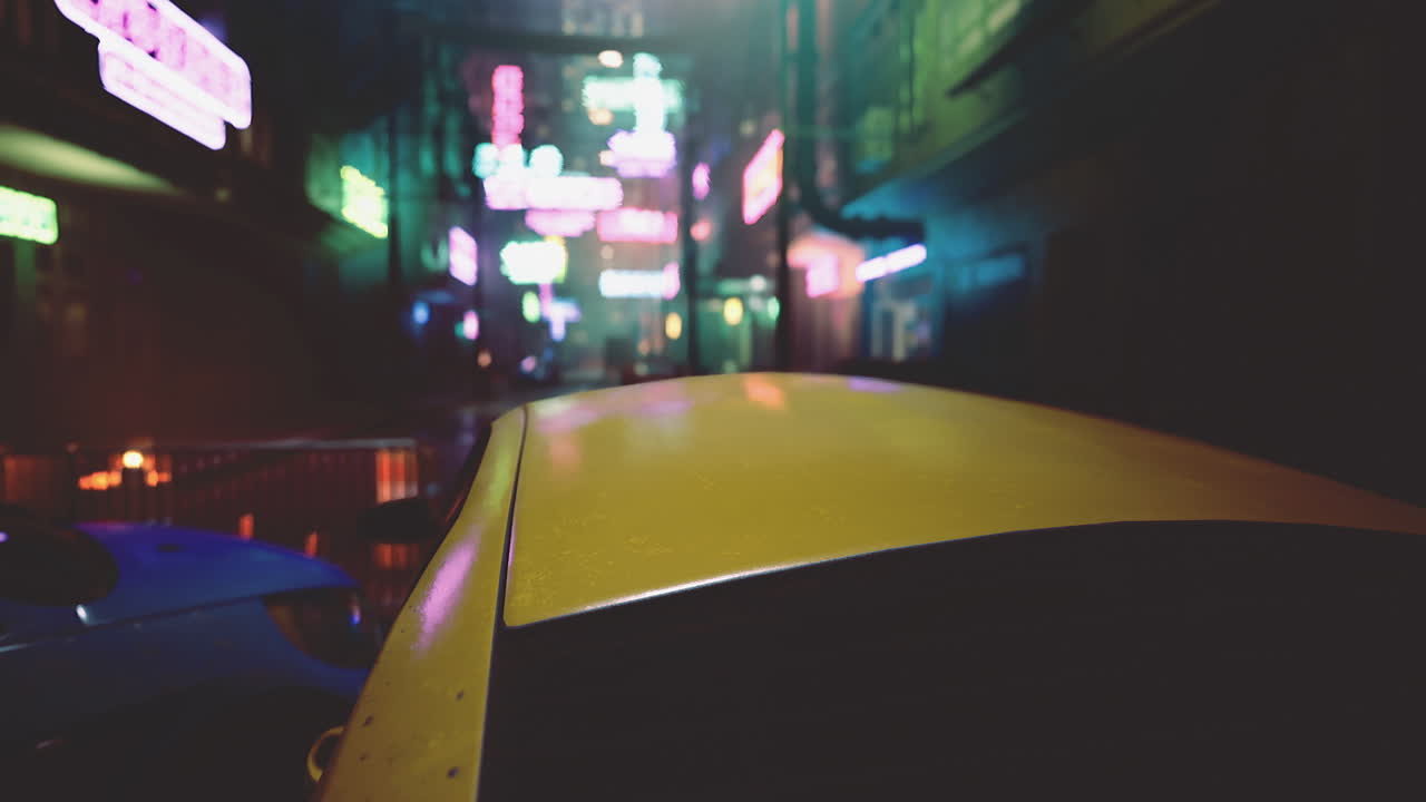 Colorful neon lit street captured from inside a yellow taxi at night