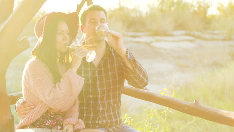 wine tasting in a beautiful sun flares at the sunset