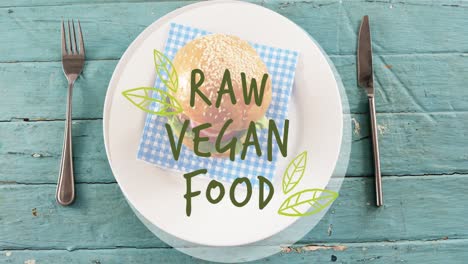 animation of raw vegan food text over fresh hamburger