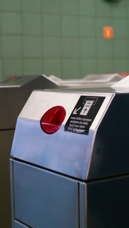 woman using subway turnstile