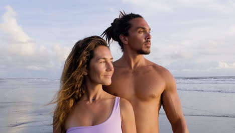 young couple posing outdoors