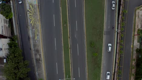 Aerial-top-down-reverse-over-Nunez-de-Caceres-avenue-in-Santo-Domingo-national-district