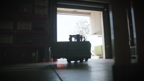 forklift moving products inside a warehouse