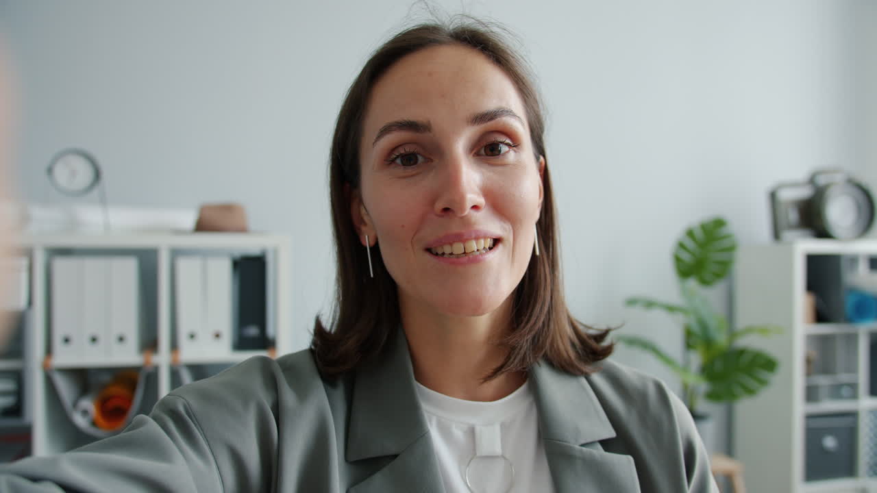 Woman in Office During Video Call