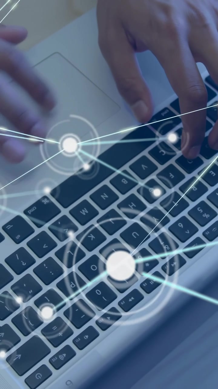User hands resting pressing keys moving to trackpad over tech keys glowing nodes visualizing data