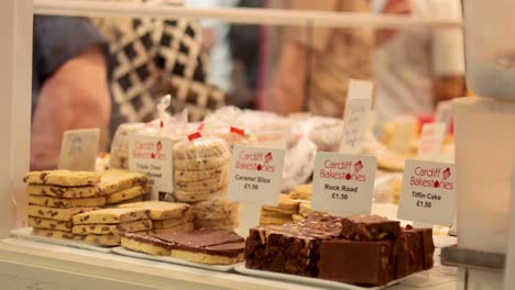 assorted sweets and cookies on display