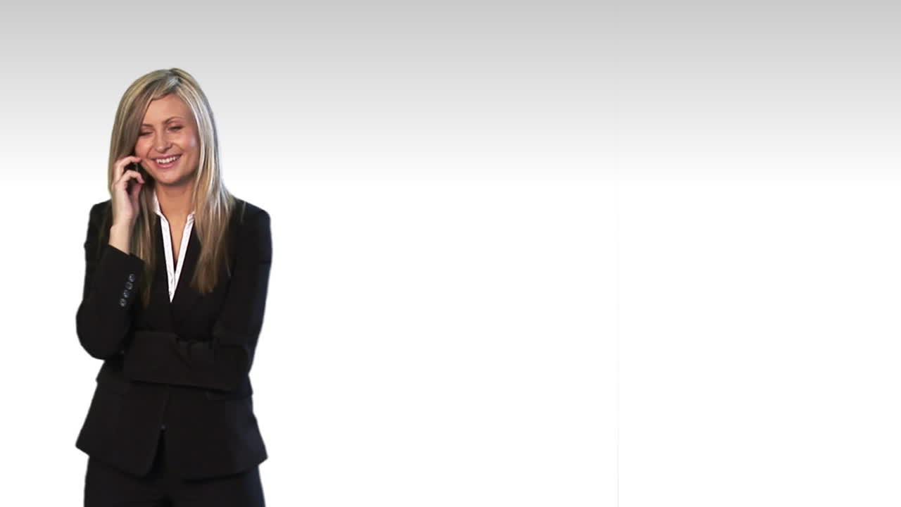 Talking business over the phone and smiling