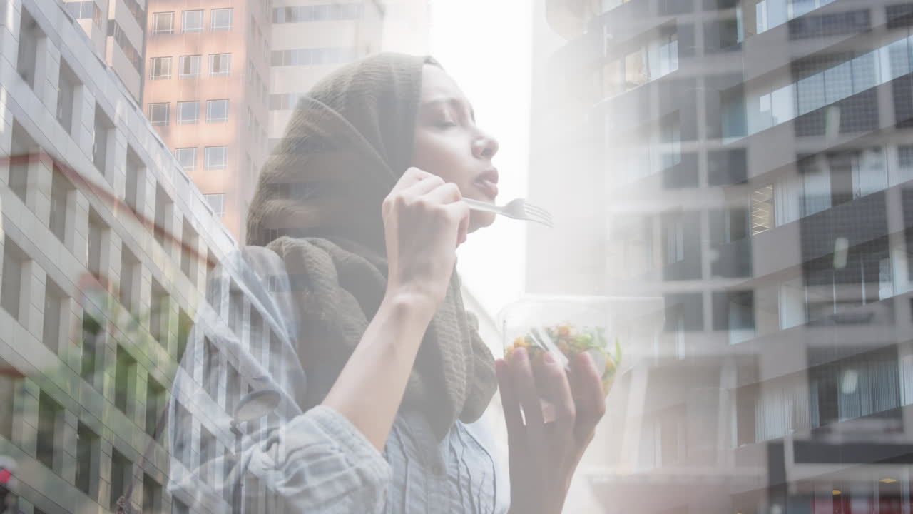 히자브를 입은 아시아 여성이 도시 풍경 위에서 러드를 즐기는 애니메이션