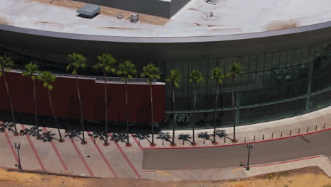 a 4k aerial shot captures the exterior of a stadium