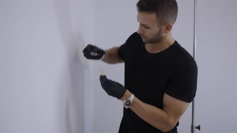 medical professional handling a syringe with yellow liquid