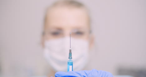 researcher working in lab scientist holding 2