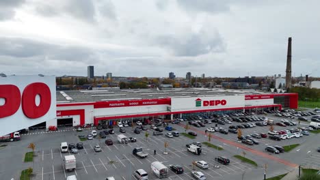 depo warehouse and parking lot on a cloudy day in klaipeda lithuania aerial view