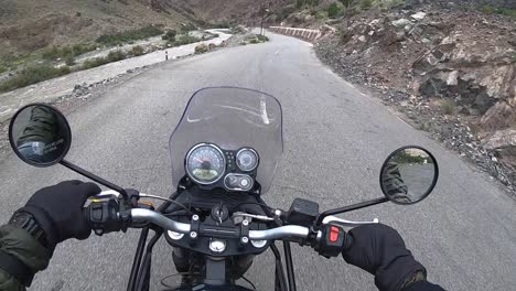 a thrilling clip of slow driving on extremely dangerous mountain mud road during rain. shot in barren mountains region of ladakh, close to china tibet border using an action cam.