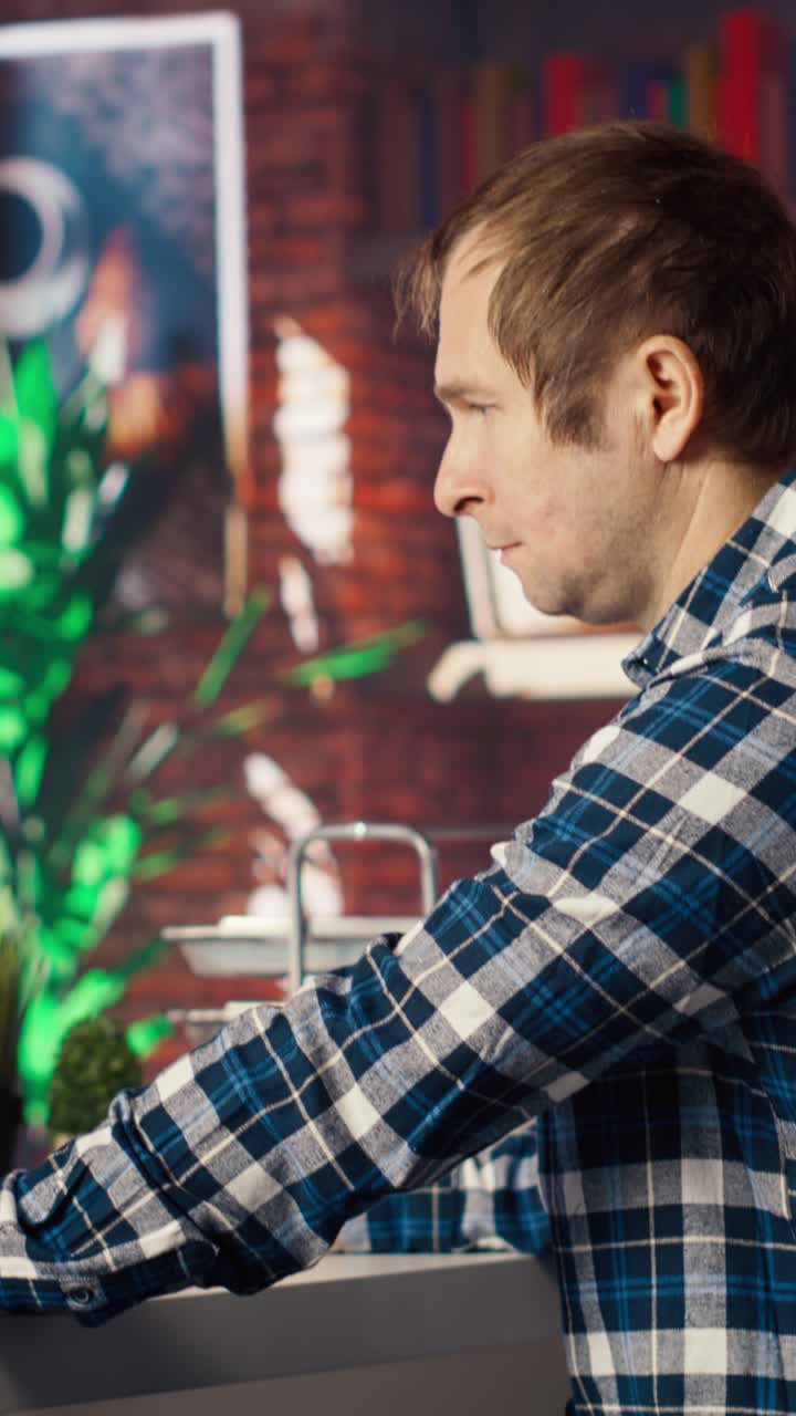 Vertical video Man having fun interacting with AI LLM chatbot PC GPT software on PC