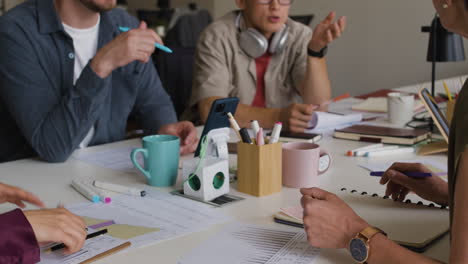 group of diverse people clapping and applauding during a meeting