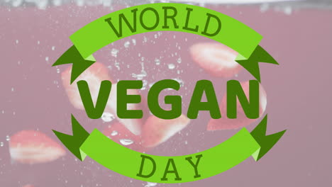 animation of world vegan day text over fruit falling in water background