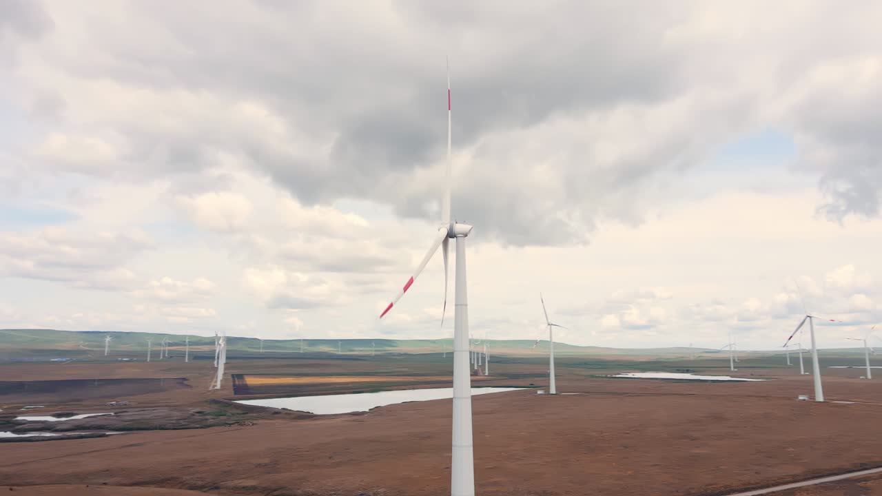 Wind generator at the alternative power station generates green clean energy