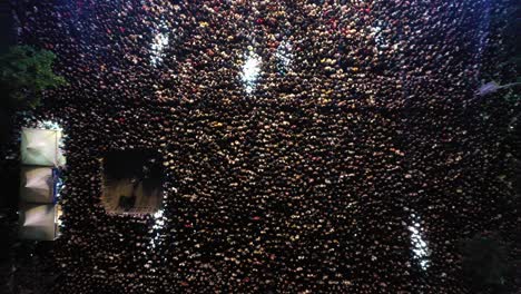 massive crowd at a nighttime event