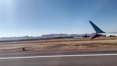 Foto-Del-Asiento-De-La-Ventana-Del-Avión-Durante-El-Despegue-En-Chihuahua